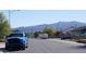 Residential street view featuring homes and mountain backdrop at 422 W Jamestown Rd, Kearny, AZ 85137