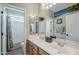 Clean bathroom with double sinks and a shower/tub combo at 4264 S Columbine Way, Gold Canyon, AZ 85118
