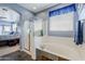 Elegant bathroom with soaking tub, shower, and tiled floors at 4264 S Columbine Way, Gold Canyon, AZ 85118