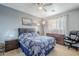 Comfortable bedroom with ceiling fan and mountain views at 4264 S Columbine Way, Gold Canyon, AZ 85118