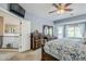 Main bedroom with a large bed and access to the loft at 4264 S Columbine Way, Gold Canyon, AZ 85118