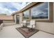 Private deck with mountain views and seating for two at 4264 S Columbine Way, Gold Canyon, AZ 85118