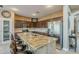 Modern kitchen with granite countertops and stainless steel appliances at 4264 S Columbine Way, Gold Canyon, AZ 85118