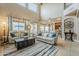 Open living area with large windows and access to backyard at 4264 S Columbine Way, Gold Canyon, AZ 85118