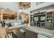 Two-story living room with a large TV and comfortable furniture at 4264 S Columbine Way, Gold Canyon, AZ 85118