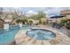 Inviting spa and pool with flagstone decking at 4264 S Columbine Way, Gold Canyon, AZ 85118