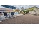 Peaceful backyard with a pool, spa, and patio at 4264 S Columbine Way, Gold Canyon, AZ 85118