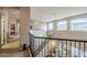 Upstairs hallway with views to the downstairs living area at 4264 S Columbine Way, Gold Canyon, AZ 85118