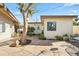 Cozy backyard with unique stone and mature tree at 4301 E Montecito Ave, Phoenix, AZ 85018