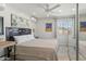Bedroom featuring a large bed and modern decor at 4301 E Montecito Ave, Phoenix, AZ 85018