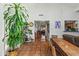Spacious living area with terracotta floors, plant and natural light at 4301 E Montecito Ave, Phoenix, AZ 85018