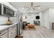 Well lit open space with a table and comfortable couch at 4301 E Montecito Ave, Phoenix, AZ 85018