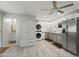 Open living space with laundry and access to full bathroom at 4301 E Montecito Ave, Phoenix, AZ 85018