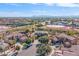 Aerial view of luxury home with a large backyard and pool at 4543 S Roy Rogers Way, Gilbert, AZ 85297