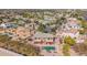 Aerial view of house, pool, trampoline, and neighborhood at 4543 S Roy Rogers Way, Gilbert, AZ 85297