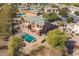An aerial view showcasing the home's backyard oasis at 4543 S Roy Rogers Way, Gilbert, AZ 85297
