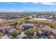Wide aerial view of a luxury home in a residential area at 4543 S Roy Rogers Way, Gilbert, AZ 85297
