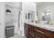 Modern bathroom with dual vanity, plenty of storage, and elegant finishes at 4543 S Roy Rogers Way, Gilbert, AZ 85297
