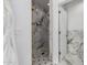 Elegant bathroom with marble shower and modern fixtures at 4543 S Roy Rogers Way, Gilbert, AZ 85297