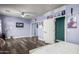 Light and airy bedroom with wood floors and mirrored closet doors at 4543 S Roy Rogers Way, Gilbert, AZ 85297