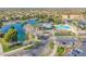Community pool, lake, and clubhouse at 4543 S Roy Rogers Way, Gilbert, AZ 85297