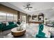 Game room features a pool table, comfortable seating, and large windows at 4543 S Roy Rogers Way, Gilbert, AZ 85297