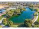 Scenic community lake with walking paths and a peaceful atmosphere at 4543 S Roy Rogers Way, Gilbert, AZ 85297