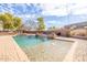 Refreshing pool with a built-in spa and plenty of lounging space at 4543 S Roy Rogers Way, Gilbert, AZ 85297