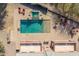 An aerial view of a luxurious pool and spa at 4543 S Roy Rogers Way, Gilbert, AZ 85297