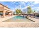 Inviting swimming pool with spacious patio area at 4543 S Roy Rogers Way, Gilbert, AZ 85297