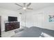 Bedroom with queen bed, dresser, and ceiling fan at 4740 E Cambridge Ave, Phoenix, AZ 85008