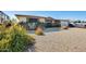 Charming single-story home with rock landscaping and a well-maintained front yard at 5501 E Dallas St, Mesa, AZ 85205