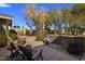 Spacious backyard with mature trees and a gravel patio area at 5820 N 83Rd St, Scottsdale, AZ 85250