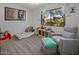 bedroom with a twin bed, toys, and plenty of natural light at 5820 N 83Rd St, Scottsdale, AZ 85250