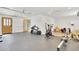 Finished garage converted into a home gym with various equipment at 5820 N 83Rd St, Scottsdale, AZ 85250