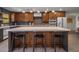 Modern kitchen with island, stainless steel appliances, and ample cabinetry at 5820 N 83Rd St, Scottsdale, AZ 85250