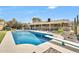 Relaxing swimming pool with diving board and spacious patio area at 5820 N 83Rd St, Scottsdale, AZ 85250