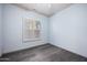 Serene bedroom with neutral paint and dark-wood flooring at 6102 E Sonoran Trl, Scottsdale, AZ 85266