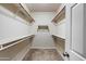 Spacious walk-in closet with built-in shelving and ample storage space at 6102 E Sonoran Trl, Scottsdale, AZ 85266