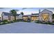 Elegant home with a stone facade, landscaped grounds and a paved driveway at 6109 E Maverick Rd, Paradise Valley, AZ 85253
