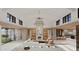 Spacious living area with high ceilings, fireplace, and open floor plan at 6109 E Maverick Rd, Paradise Valley, AZ 85253