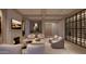 Cozy sitting area with fireplace and a built-in wine cellar at 6109 E Maverick Rd, Paradise Valley, AZ 85253