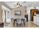 Bright dining area with table and chairs, near kitchen at 6892 S Lake Forest Ct, Chandler, AZ 85249