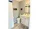 Bathroom with double sinks and updated cabinets at 7750 E Broadway Rd # 677, Mesa, AZ 85208