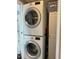 Stackable washer and dryer in a bright laundry room at 7750 E Broadway Rd # 677, Mesa, AZ 85208