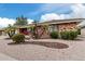 Charming single-story brick home with a well-maintained desert front yard at 7950 E Lakeview Ave, Mesa, AZ 85209