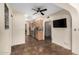 Bright kitchen view with stainless steel appliances and a convenient passthrough to the living area at 7950 E Lakeview Ave, Mesa, AZ 85209