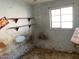 Small interior room with wood shelves and a window at 844 S Macdonald --, Mesa, AZ 85210