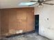 Room with wood paneling, ceiling fan and skylight at 844 S Macdonald --, Mesa, AZ 85210