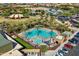 Community pool and recreation area with ample parking and landscaping at 10037 E Rubidium Ave, Mesa, AZ 85212